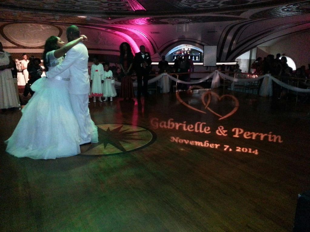 A couple dancing to their first dance with their custom GOBO