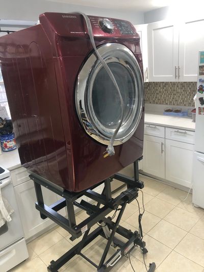 Air-Sled Lift cart with a Samsung dryer on top