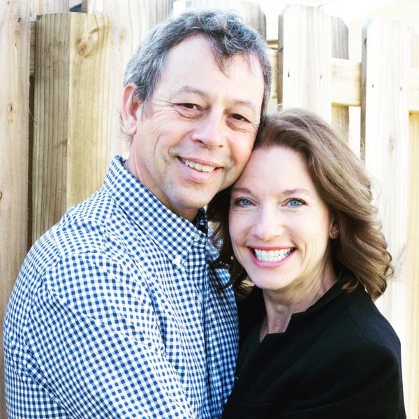 CEO and founder of Bad Glinda Soap Studio Heather Eaton with partner Jake Niceley smiling.