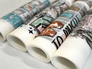 DTF Gang Sheets. 22 inches wide by as long as you'd like. Anything over 20 feet send me an email.