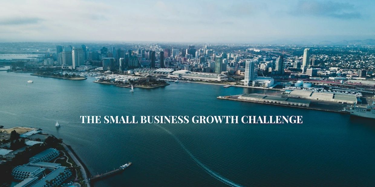A city skyline with text 'THE SMALL BUSINESS GROWTH CHALLENGE'.