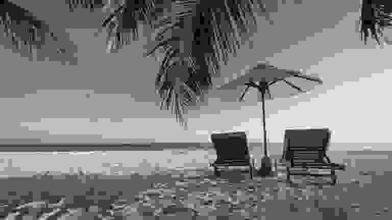 A relaxing chair and umbrella by the beach is the perfect setting to announce RITS 2021