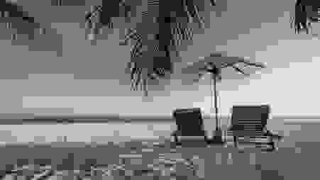 A relaxing chair and umbrella by the beach is the perfect setting to announce RITS 2021