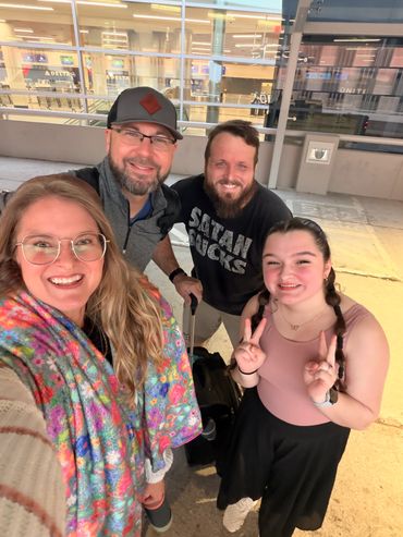 my sister and us at the airport