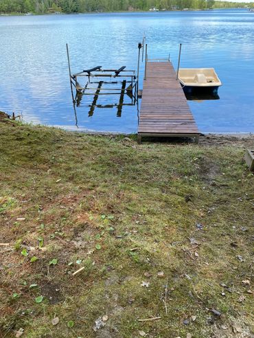 This property comes with this freshly updated dock and paddle boat. Bookings byLake State Property