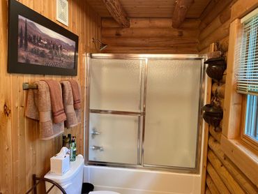 one of two bathrooms in the Happy Daze Cabin with Lake State Property, inquire about our VRBO links