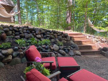 Freshly added new plants and hammocks in these retaining walls at the Lake State Property cabin