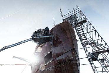 Half way finished HUll and superstructure of a 61 meter superyacht during construction