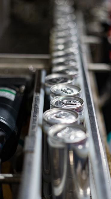 labels being applied on the can line we also sell reclosable can lids