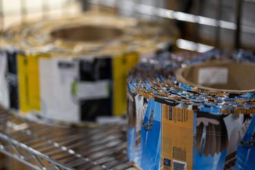 shrink sleeves ready to be applied at augusta label and packaging we also sell reclosable can lids