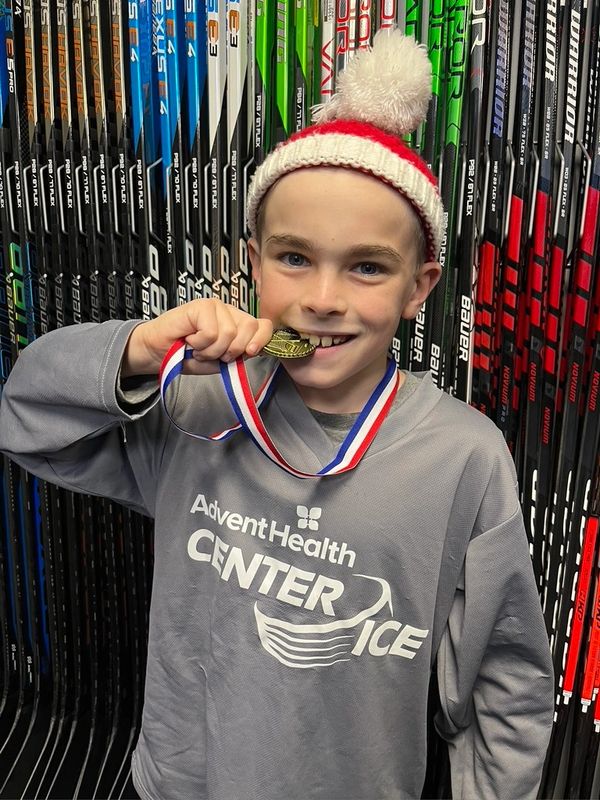 Mason William Fox after winning the U10 Championship game at Advent Health Center Ice in December 20