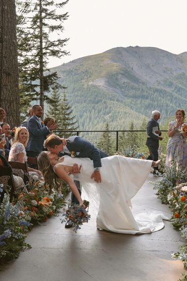 bride and groom kiss