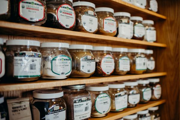 Shelves containing bulk spices