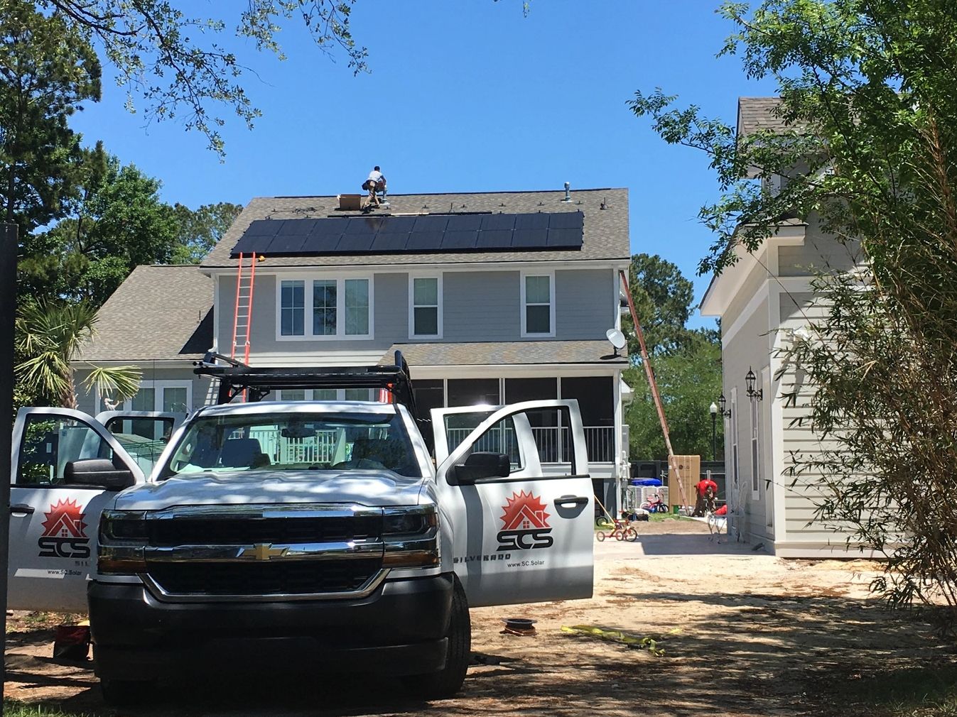 South Carolina Solar installing a roof top solar energy system with LG solar lanels