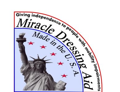 Photo of the logo badge of the Miracle Dressing Aid