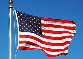 Old Glory, US flag flying high in the breeze, above all others.