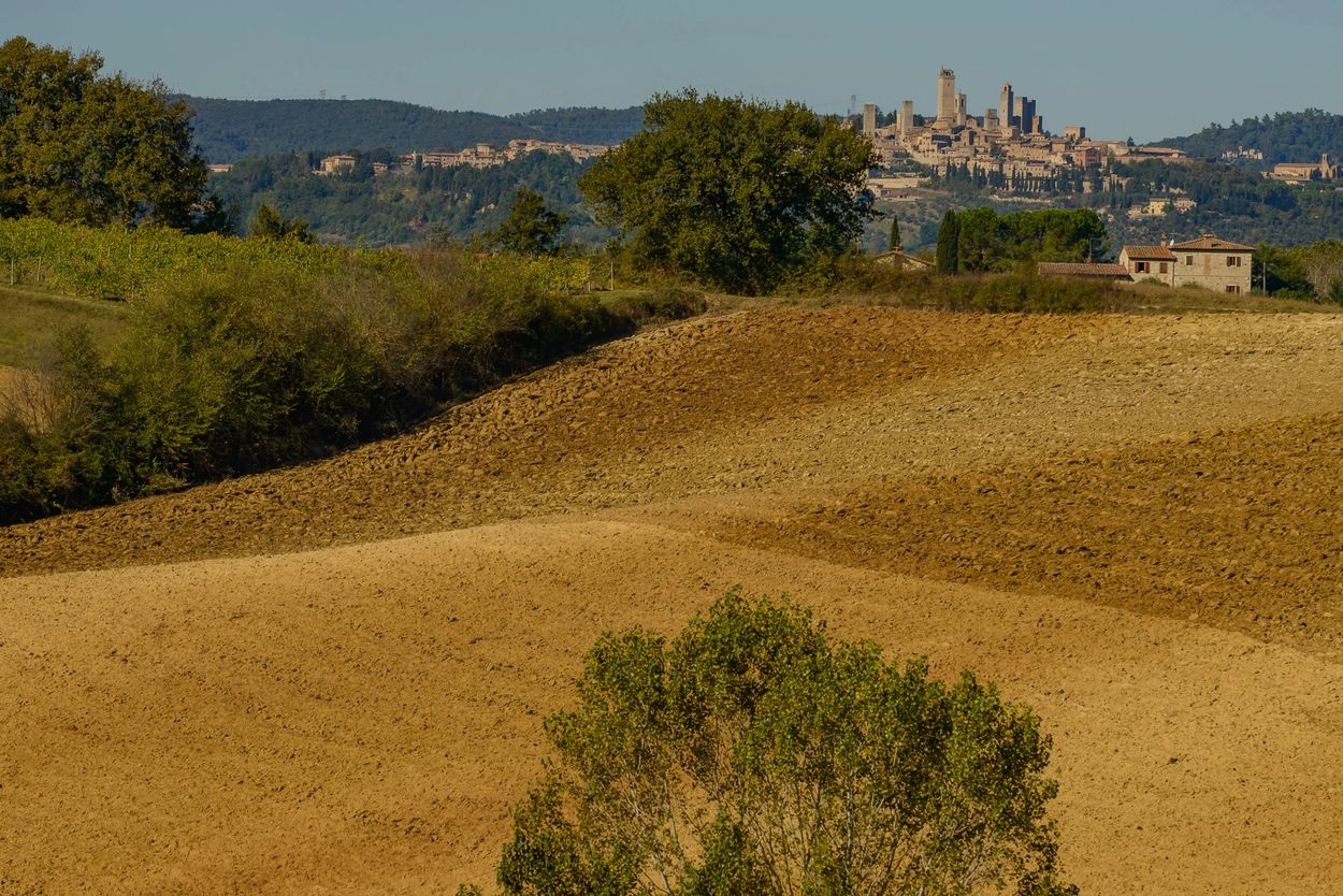 Hiking to San Gimignano, the hilltop town in Tuscany, Italy famous for its seven towers.