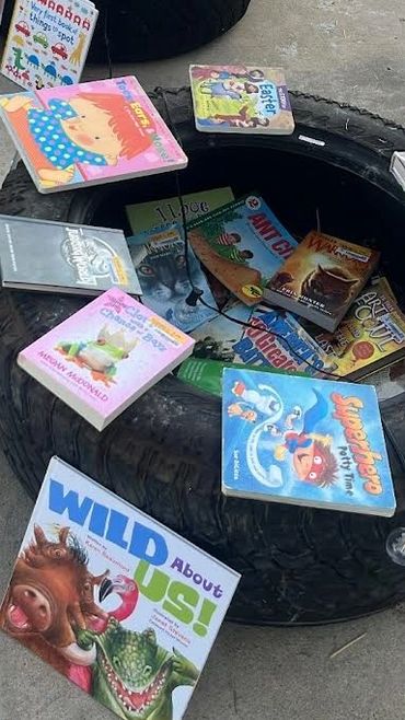 The tire display drew kids in with curiosity and made the book-picking experience fun and unforgetta