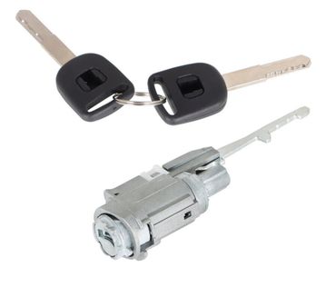 Set of two car keys with an ignition lock cylinder.