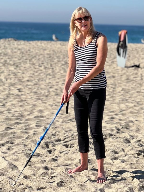 A beautiful woman with a stick 