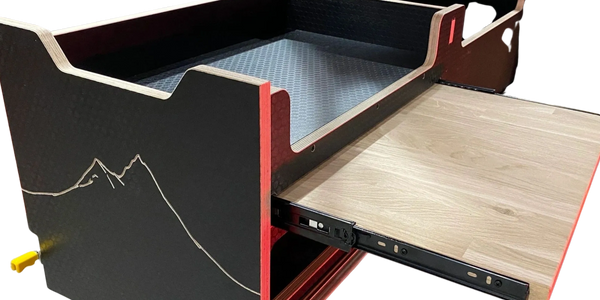 Bench seating campervan furniture with pull out kitchen - made by Camper Kitchens.