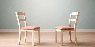 Two empty chairs across from one another to depict Good Egg's mentoring and guidance service
