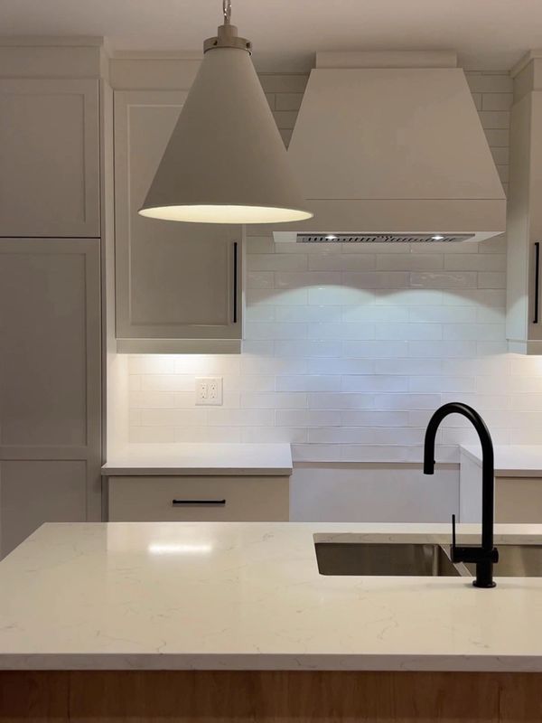 Custom kitchen in Kitchener's east ward. off white cupboards, white subway tile back splash