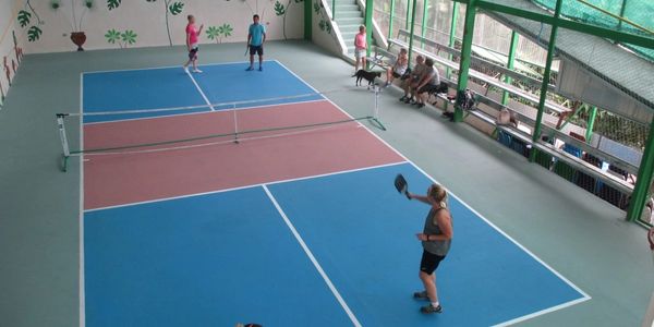 Participants playing pickleball at Vientos Bajos Activities Center in Costa Rica