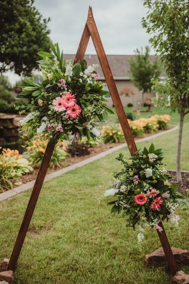 Custom wedding arch with floral on both sides, a frame wedding arch