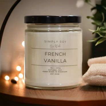 Natural soy wax candle jar surrounded by lights.