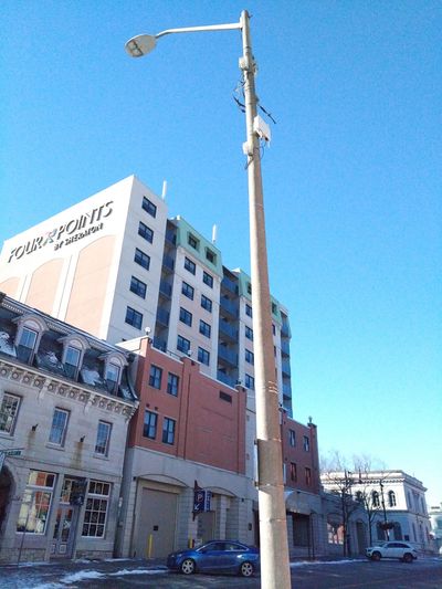 Small cell antenna at the corner of King St and Clarence St, Kingston, ON.