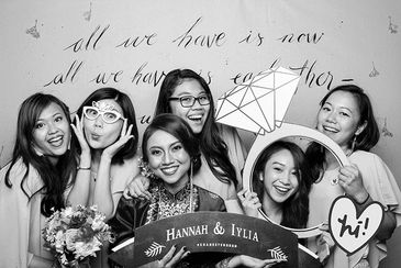 A group of women using props for pictures