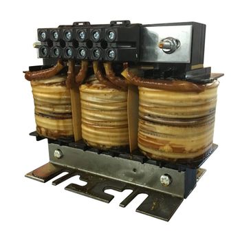 Three-coil electrical transformer mounted on a metal base.