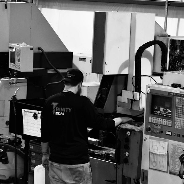 Photo of Trinity EDM employee performing plunge EDM