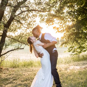 couple kissing wedding photography