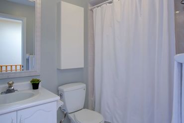 Main Bathroom with combined bathtub and shower