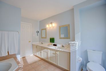 Master Bathroom with large double sink counter