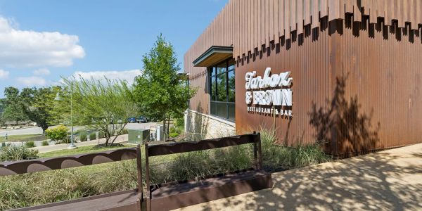 Exterior view of Tarbox & Brown restaurant with corrugated facade.
