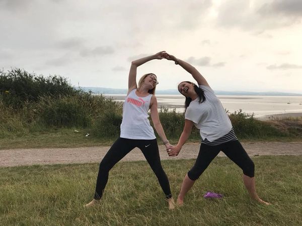 Laura and Clare on a charity yoga event raising money for Ronald Mc Donald house.