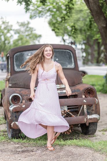 Senior photos with a boutique experience and a fun experience.