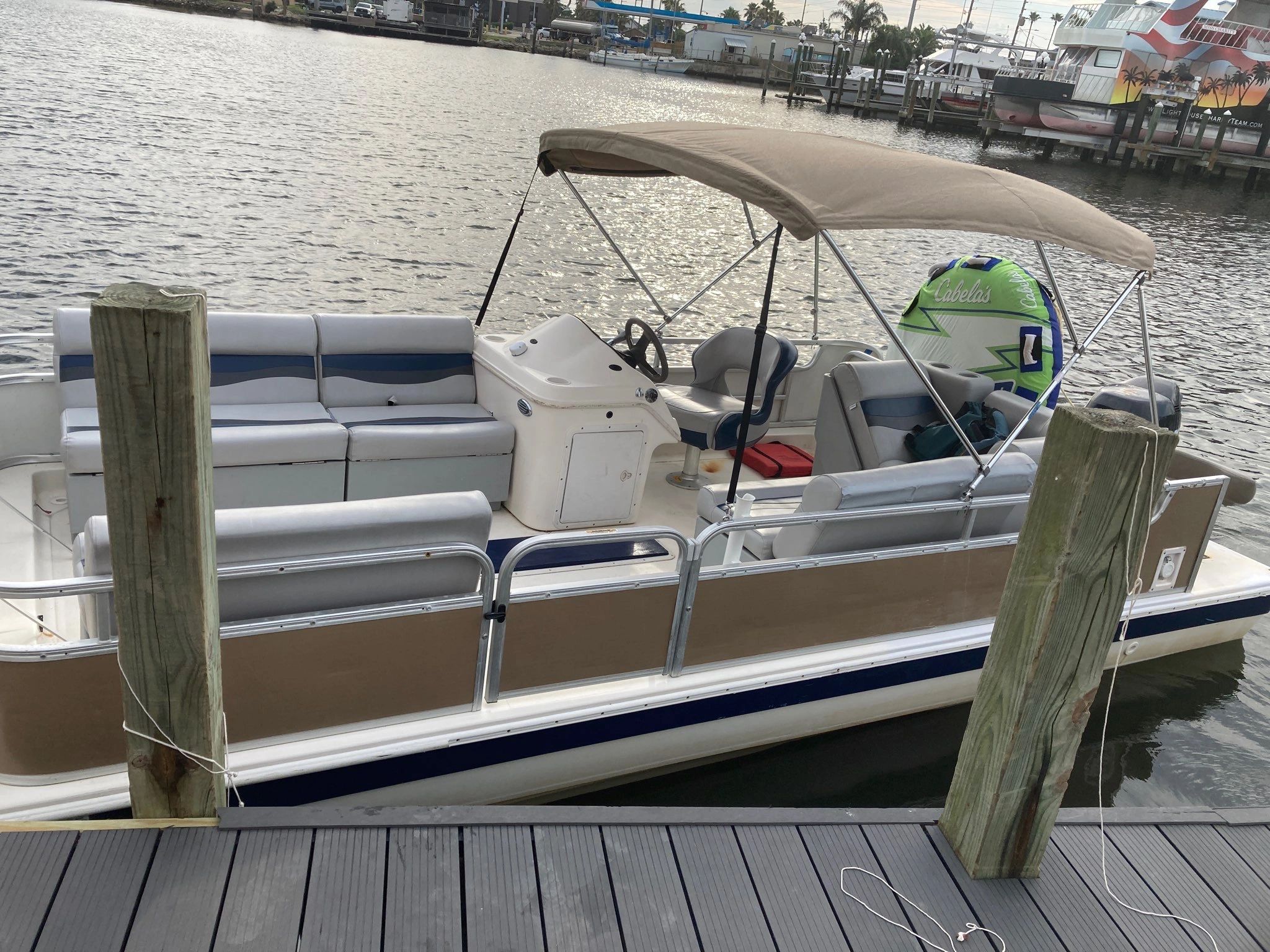 Our Deckboat Gloria! Ready to take you out tubing on the Bay!