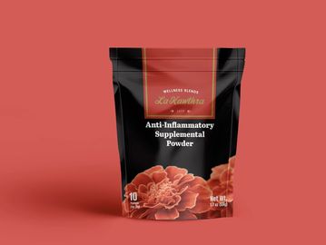 Anti-Inflammatory Supplemental Powder in a bag with orange flowers.