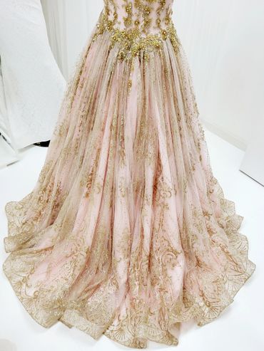 Custom evening gown for bride at gypsy wedding reception. Pink with gold accent throughout.
