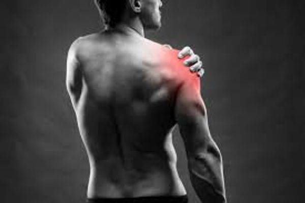 Man holding his painful, red-highlighted shoulder.
