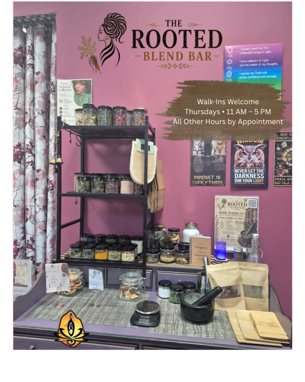 Herbal blend bar with jars, packets, and a welcoming sign on a purple wall.