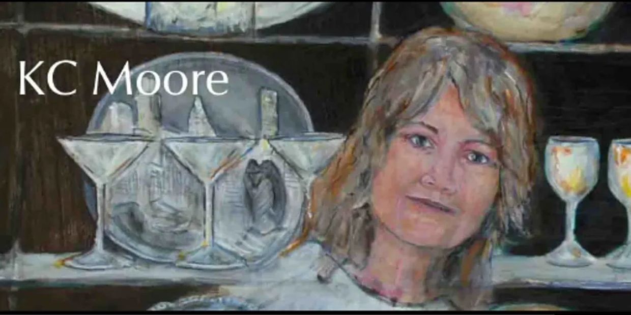Portrait of a woman with glasses and plates in the background labeled KC Moore.