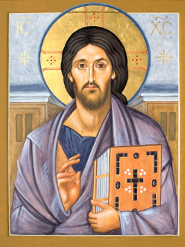 Icon of Jesus Christ holding a book and blessing with his right hand.