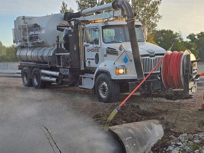 cleaning a large culvert in London Ontario