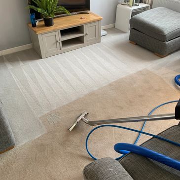 Cleaning carpet with suction hoover 