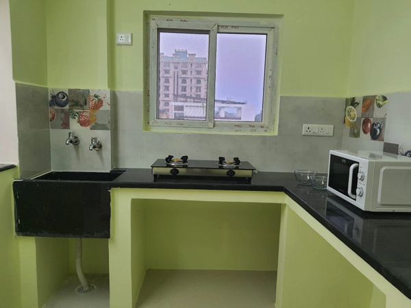 Kitchen with Microwave and Gas Stove